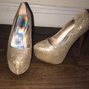 Gold shiny high heels
